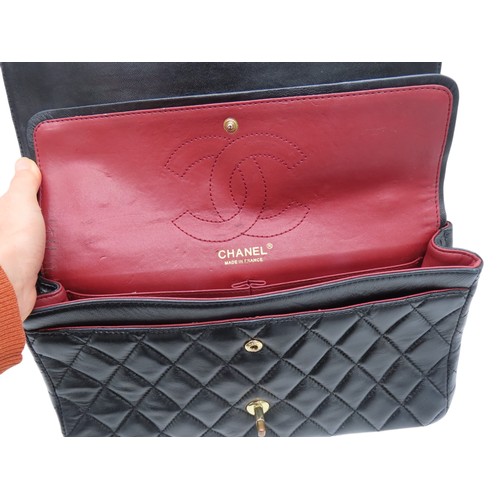 286 - CHANEL BLACK LEATHER QUILTED FLAP BAG with authentication card and Chanel dust bag.Main compartment ... 