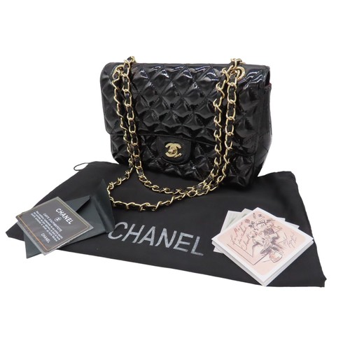 287 - CHANEL BLACK PATENT QUILTED FLAP BAG with authentication card and Chanel dust bag.Main compartment w... 