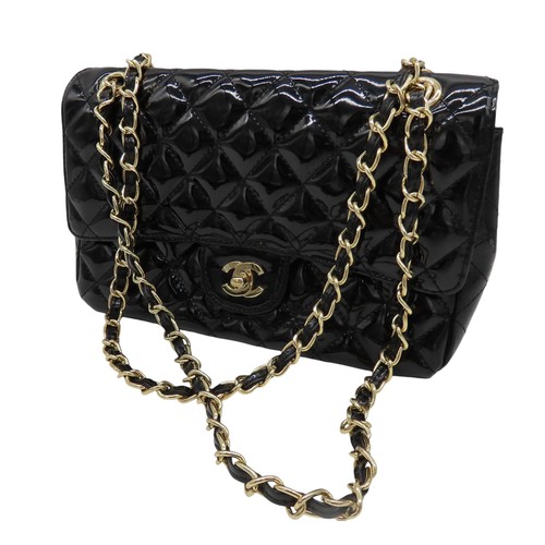 287 - CHANEL BLACK PATENT QUILTED FLAP BAG with authentication card and Chanel dust bag.Main compartment w... 