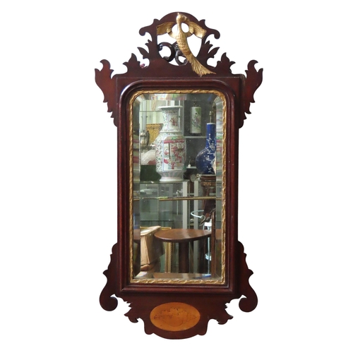 202 - A 19TH CENTURY MAHOGANY FRET CUT PIER MIRROR, the bevelled rectangular plate mounted in a scroll car... 