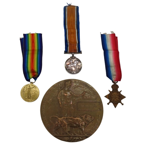 439 - A GROUP OF THREE FIRST WORLD WAR MEDALS AND COMMEMORATIVE PLAQUE, relating to 2846 Pte. H Wade, Y.L.... 