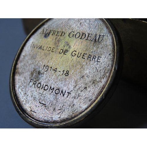 437 - A 1914 CHRISTMAS TIN, TRENCH ART PENCIL AND INVALIDE DE GUERRE MEDAL, presented to Alfred Godeau, to... 