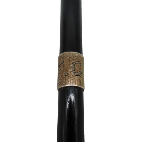 658 - A SILVER MOUNTED EBONISED CONDUCTOR'S BATON, bearing the monogram F.C, marked Ebenezer Newman & ... 