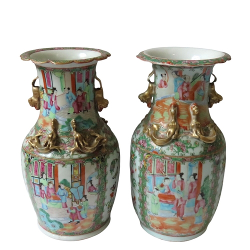 356 - A NEAR PAIR OF CHINESE FAMILLE ROSE BALUSTER VASES, LATE QING DYNASTY, 19TH CENTURY, with applied gi... 