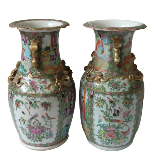 356 - A NEAR PAIR OF CHINESE FAMILLE ROSE BALUSTER VASES, LATE QING DYNASTY, 19TH CENTURY, with applied gi... 