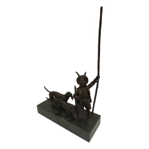 588 - A HUMOROUS BRONZE HUNTING GROUP, 20TH CENTURY, depicting an infant with a rifle over his shoulder, b... 