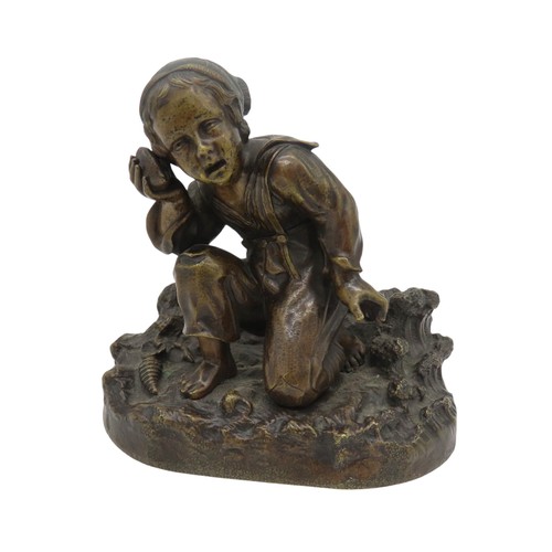 591 - A BRONZE FIGURE OF A KNEELING BOY, modelled in sailor's attire holding a conch to his ear, knelt on ... 