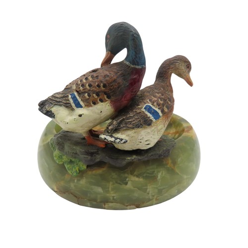 585 - A PAIR OF AUSTRIAN SCHOOL COLD PAINTED BRONZE DUCKS, 20TH CENTURY, mounted on a turned onyx dish9 cm... 