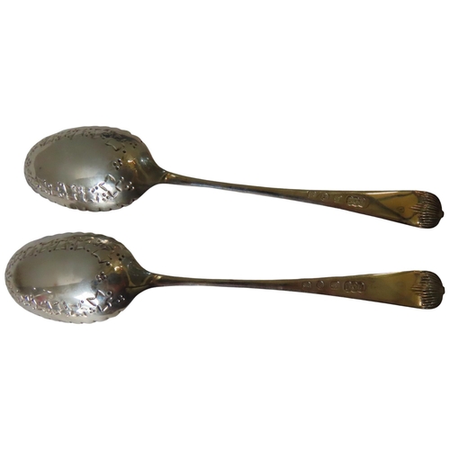 670 - A PAIR OF ELKINGTON SILVER PARCEL GILT SERVING SPOONS, the crimped edge gilded bowls with chased vin... 