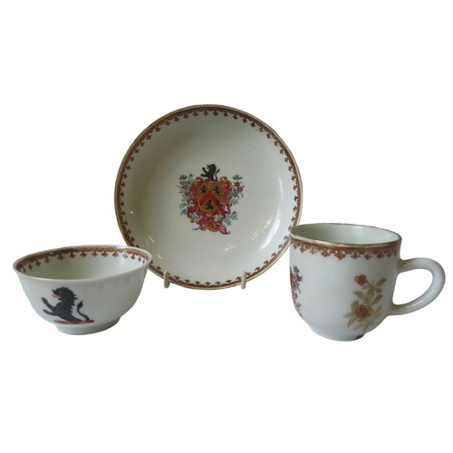 144 - 19TH CENTURY CHINESE EXPORT PORCELAIN ARMORIAL TEA BOWL, CUP AND SAUCER, decorated with crest