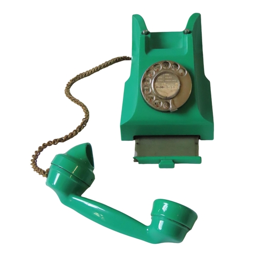 581 - A VINTAGE GPO BAKELITE TELEPHONE, CIRCA 1950, in a vibrant green casing, Type 332L, converted to wor... 