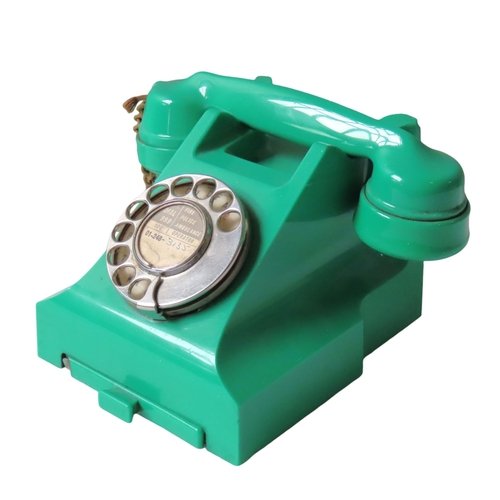 581 - A VINTAGE GPO BAKELITE TELEPHONE, CIRCA 1950, in a vibrant green casing, Type 332L, converted to wor... 