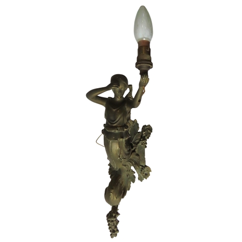 194 - AN ORNATE VICTORIAN BRASS GAS BRACKET IN THE FORM OF A WOMAN emanating from a scroll-work mount now ... 