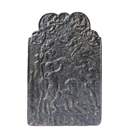 132 - A CAST IRON FIREBACK decorated with a scene of a figure with a goat, possibly Bacchus.62 x 40 cms... 