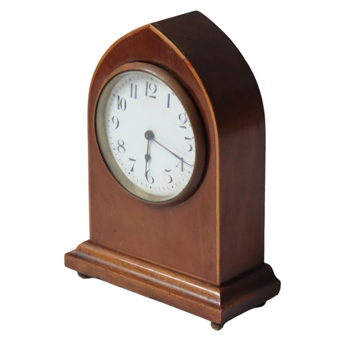 170 - AN EDWARDIAN MAHOGANY MANTEL CLOCK, gothic arch form case with line inlay, the 3.5 inch white enamel... 