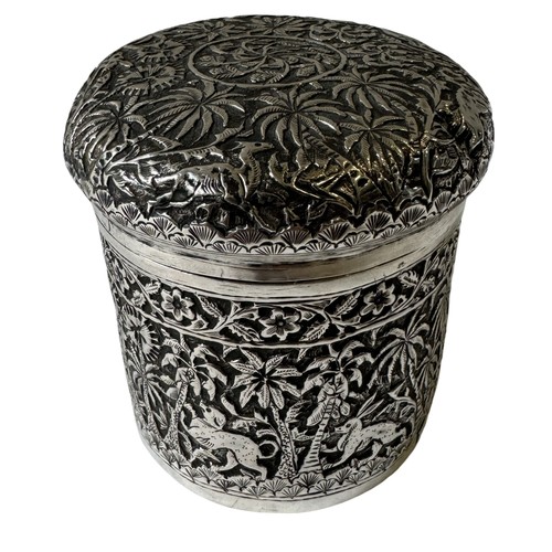 643 - AN INDIAN SILVER COVERED POT, the cylindrical vessel and cover with chased decoration throughout, de... 