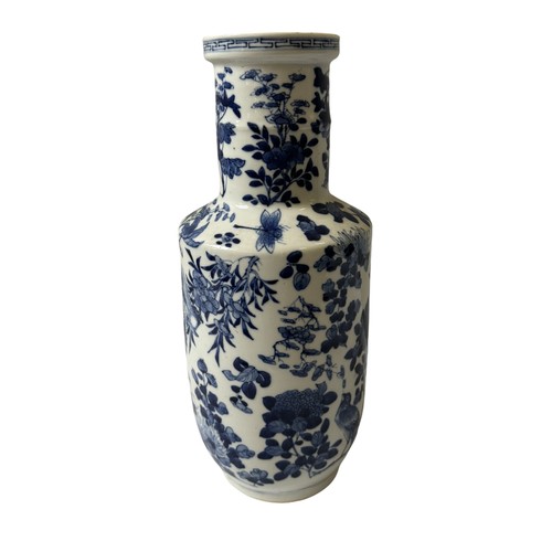 296 - A CHINESE BLUE AND WHITE ROULEAU VASE, the sides painted with insects amongst a profusion of blossom... 