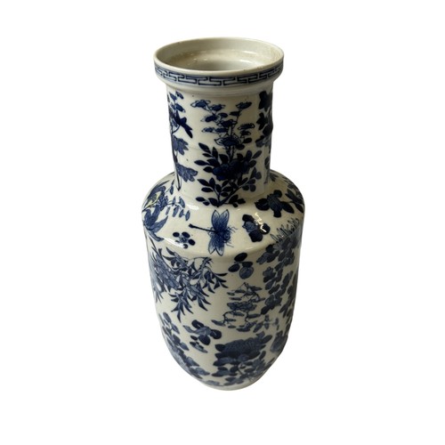 296 - A CHINESE BLUE AND WHITE ROULEAU VASE, the sides painted with insects amongst a profusion of blossom... 