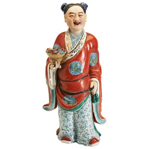 161 - A FUJIAN GUILD PORCELAIN FIGURE OF 'LAN CAIHE' ONE OF EIGHT IMMORTALS, WITH IMPRESSED MARKEARLY 20TH... 