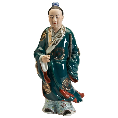 166 - A FUJIAN GUILD PORCELAIN FIGURE OF 'HAN XIANGZI' ONE OF EIGHT IMMORTALSEARLY 20TH CENTURY 韩湘子瓷塑像 20世... 