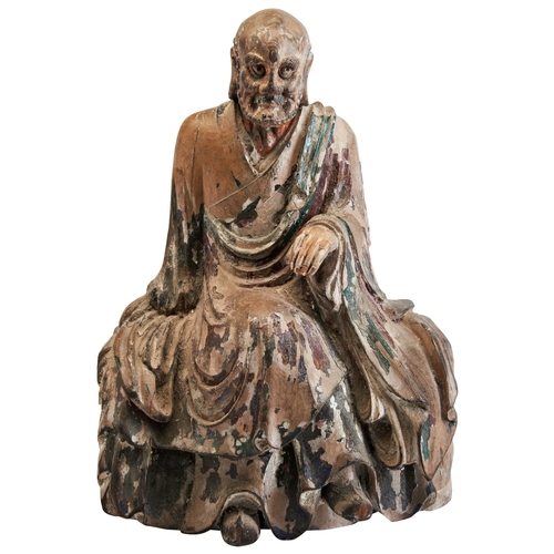 381 - A LARGE CARVED WOOD AND POLYCHROME DECORATED FIGURE OF SEATED LOHANMING / QING DYNASTY木雕罗汉像 明/清 the ... 