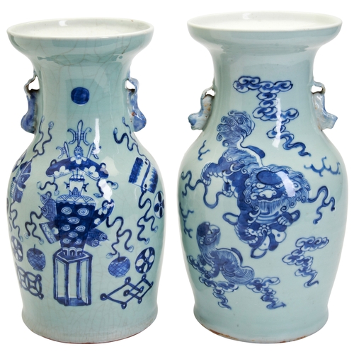 98 - TWO UNDERGLAZE-BLUE CELADON-GLAZED VASESQING DYNASTY, 19TH CENTURY豆青釉青花瑞狮‘博古纹’瓶 一对 清 19世纪33cm & ... 