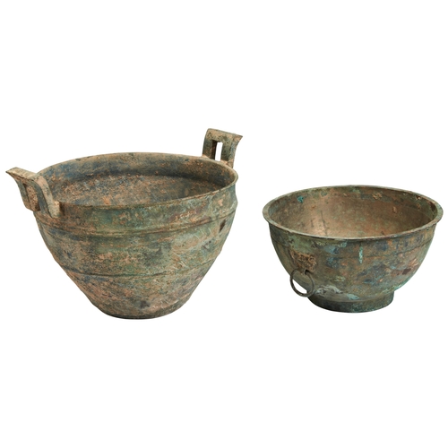 33 - TWO ARCHAIC BRONZE STEAMING BASKETSHAN DYNASTY青铜炉两件 汉one with U-shaped upright handles and the other... 