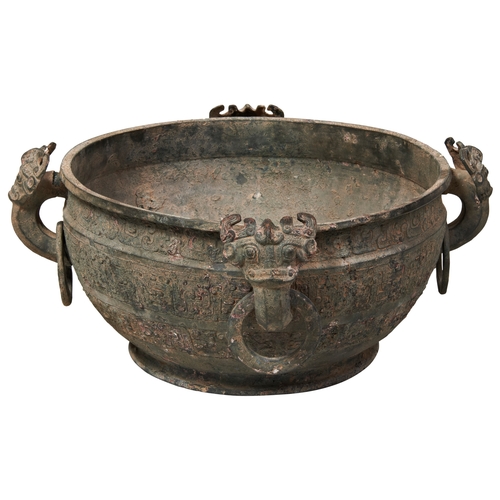 35 - A LARGE ARCHAIC BRONZE 'INSCRIBED' WATER BASIN (JIAN)EASTERN ZHOU DYNASTY 蟠螭纹兽耳青铜鑑 西周the sides decor... 