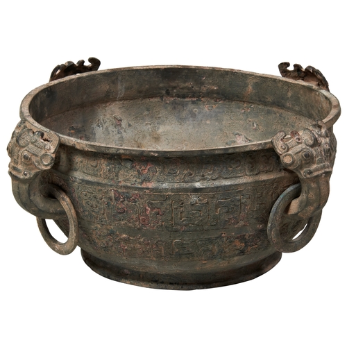 35 - A LARGE ARCHAIC BRONZE 'INSCRIBED' WATER BASIN (JIAN)EASTERN ZHOU DYNASTY 蟠螭纹兽耳青铜鑑 西周the sides decor... 