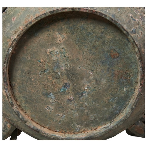 35 - A LARGE ARCHAIC BRONZE 'INSCRIBED' WATER BASIN (JIAN)EASTERN ZHOU DYNASTY 蟠螭纹兽耳青铜鑑 西周the sides decor... 