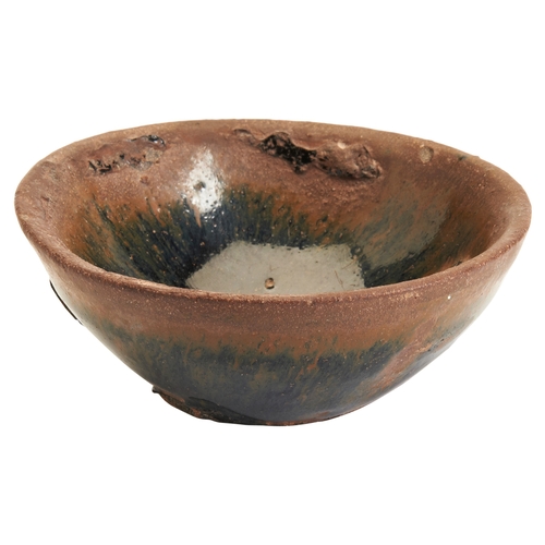 27 - A SMALL 'HARE'S FUR' BOWLSONG DYNASTY (AD 960-1279)兔毫盏 宋covered in a rich lustrous black glaze strea... 