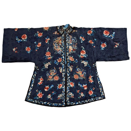 349 - A MIDNIGHT-BLUE-GROUND SILK EMBROIDERED INFORMAL ROBE LATE QING DYNASTY刺绣女服  晚清finely worked in brig... 