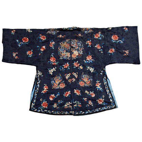 349 - A MIDNIGHT-BLUE-GROUND SILK EMBROIDERED INFORMAL ROBE LATE QING DYNASTY刺绣女服  晚清finely worked in brig... 