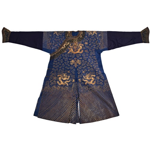 361 - A BLUE-GROUND SUMMER GAUZE 'DRAGON' ROBE (JIFU)QING DYNASTY, 19TH CENTURY藏青地金丝海水江崖龙纹吉服 清 19世纪worked ... 