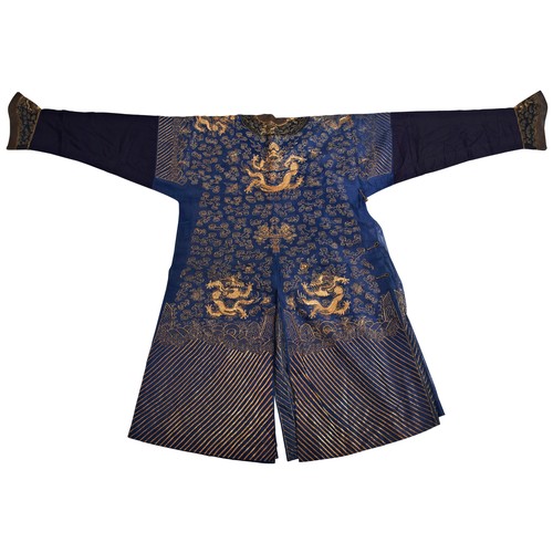 361 - A BLUE-GROUND SUMMER GAUZE 'DRAGON' ROBE (JIFU)QING DYNASTY, 19TH CENTURY藏青地金丝海水江崖龙纹吉服 清 19世纪worked ... 