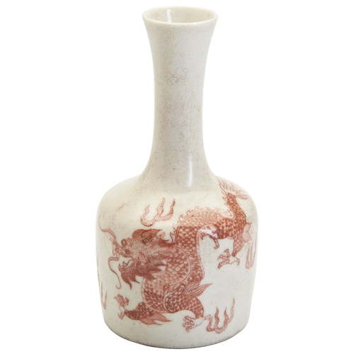 182 - A COPPER RED 'DRAGON' BOTTLE VASE,18TH CENTURY釉里红龙纹瓶 清 18世纪an underglaze red dragon chasing a flamin... 