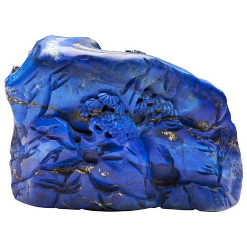 246 - AN EXCEPTIONAL CARVED LAPIS LAZULI BOULDERQIANLONG PERIOD (1736-1795)青金石亭台松林人物山子 清 乾隆 (1736-1795) of... 