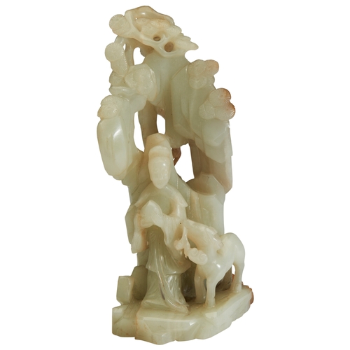 249 - A GREYISH-WHITE CARVED JADE 'LADY AND DEER' GROUPQING DYNASTY, 18TH CENTURY青白玉麻姑献寿摆件 清 18世纪depicting... 