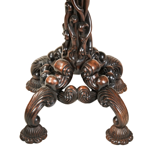 447 - A FINE CARVED HUANGHUALI 'LILY' TABLEQING DYNASTY, EARLY 19TH CENTURY黄花梨巴洛克风格桌  清 19世纪the shaped cir... 