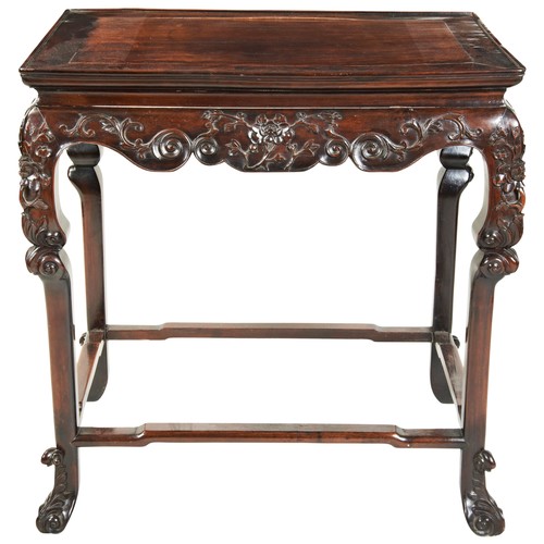 448 - A FINE HUANGHUALI CARVED WINE TABLEQING DYNASTY, 18TH CENTURY黄花梨桌 清 18世纪the rectangular top with a '... 