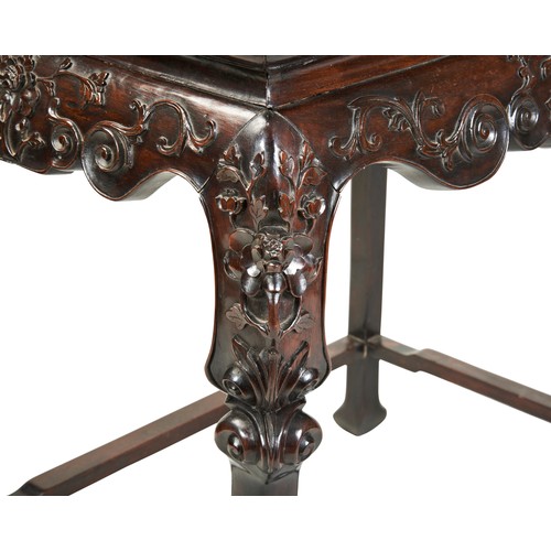 448 - A FINE HUANGHUALI CARVED WINE TABLEQING DYNASTY, 18TH CENTURY黄花梨桌 清 18世纪the rectangular top with a '... 