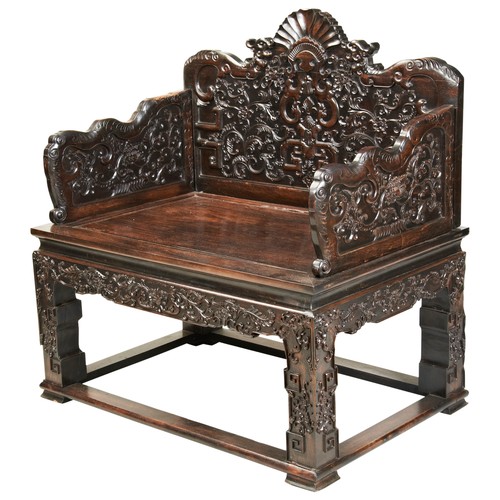 449 - AN IMPRESSIVE CARVED ZITAN THRONE CHAIRMID-QING PERIOD紫檀雕龙椅 清中期the shaped stepped back and sides fin... 