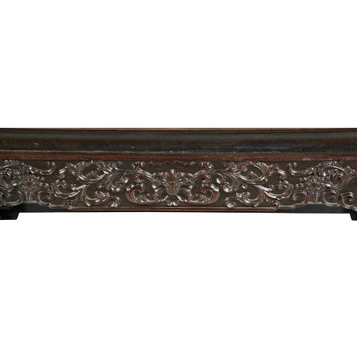 449 - AN IMPRESSIVE CARVED ZITAN THRONE CHAIRMID-QING PERIOD紫檀雕龙椅 清中期the shaped stepped back and sides fin... 