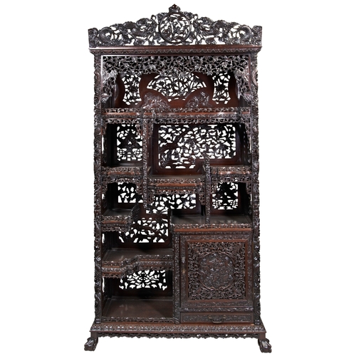 454 - AN IMPRESSIVE CARVED 'ZITAN' HARDWOOD DISPLAY CABINETQING DYNASTY, 19TH CENTURY紫檀博古架 清 19世纪the cabin... 