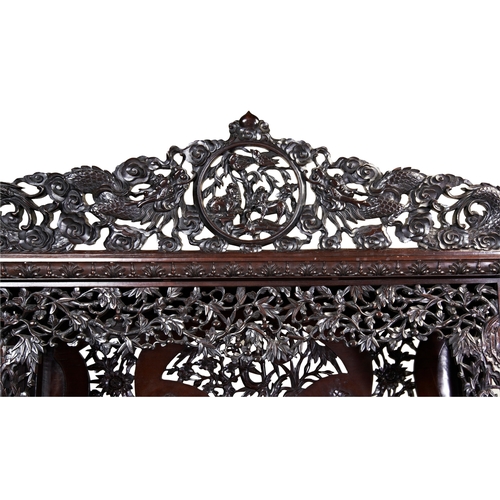 454 - AN IMPRESSIVE CARVED 'ZITAN' HARDWOOD DISPLAY CABINETQING DYNASTY, 19TH CENTURY紫檀博古架 清 19世纪the cabin... 