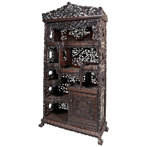 454 - AN IMPRESSIVE CARVED 'ZITAN' HARDWOOD DISPLAY CABINETQING DYNASTY, 19TH CENTURY紫檀博古架 清 19世纪the cabin... 