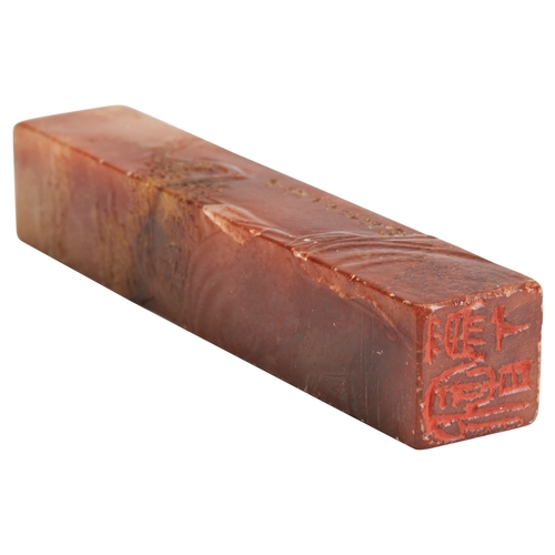 281 - A CARVED 'CHERRY-BLOSSOM' STONE SEALQING DYNASTY, DATED 1913吴昌硕刻桃花洞印  清 1913 inscribed by Wu Chang S... 