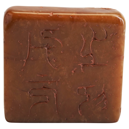 311 - A CARVED SOAPSTONEQING DYNASTY (1644-1911)寿山石印  清(1644-1911)carved prunus and archaistic script, fit... 