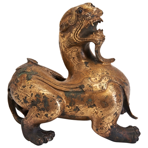 46 - A GILT BRONZE MYTHICAL BEAST, HAN STYLE,20TH CENTURY 铜鎏金辟邪 汉风格20世纪the mythical beast probably is 'ta... 