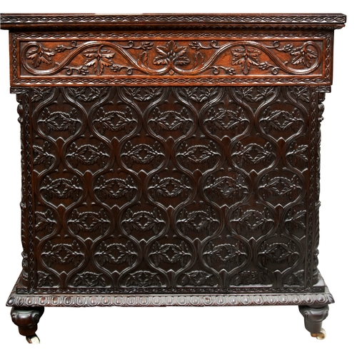 484 - A GOOD ANGLO-INDIAN CARVED PADOUK PEDESTAL DESK19TH CENTURY the sides finely carved with an all desi... 